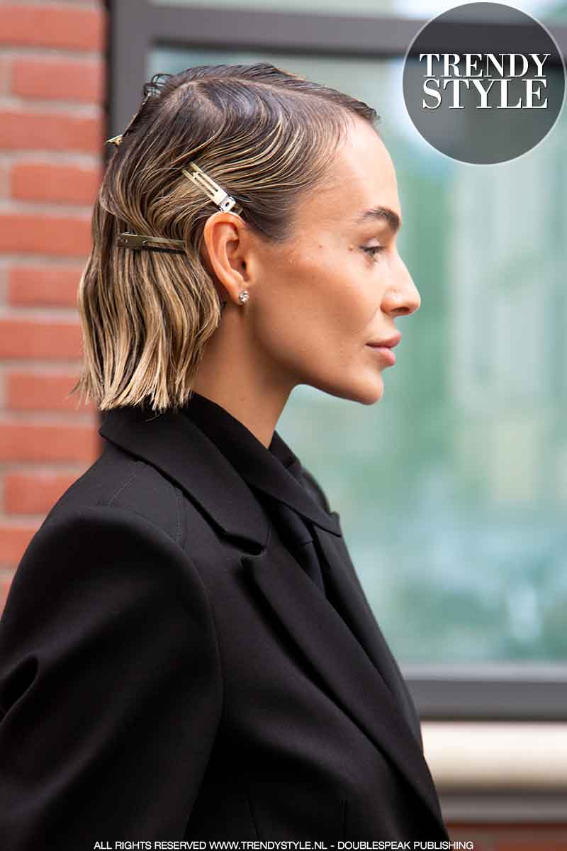 Haarstylingtrends. Fingerwaves (met speldjes) of glad gestyled gelkapsel