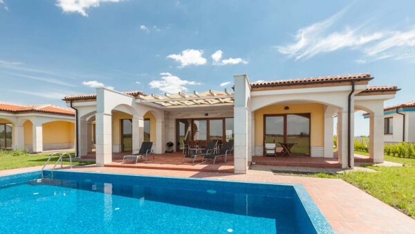 Vakantiewoning kopen? Zo richt je deze gezellige in!