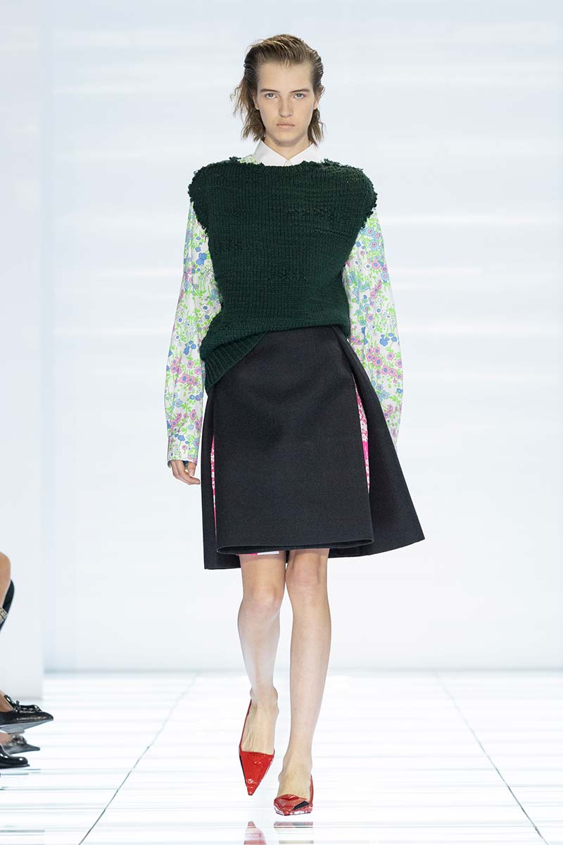 Rok met fantasie blouse en spencer. Photo courtesy of Prada