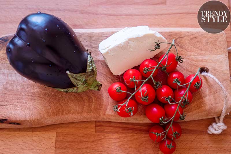 Pasta met aubergine, verse tomaten en gezouten ricotta. Foto: Charlotte Mesman